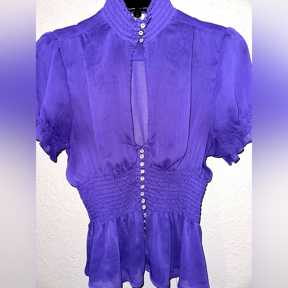 Sheer button down low cut blouse, small in size, 16 diamond buttons in total.